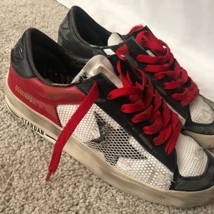 Distressed black and red Stardan LTD sneakers